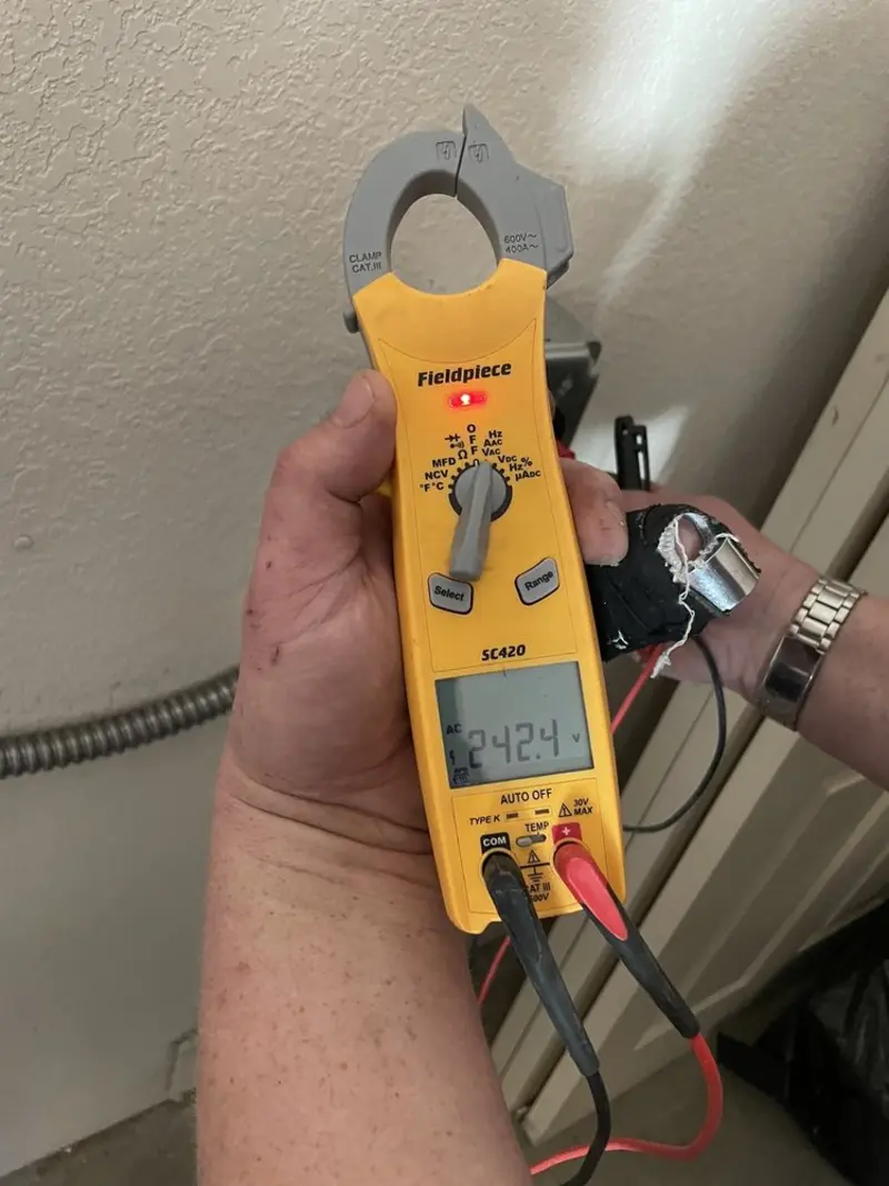 Voltage testing with clamp meter during Generator Installation in Munster